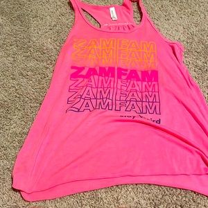 This is a workout shirt and a medium and it’s pink